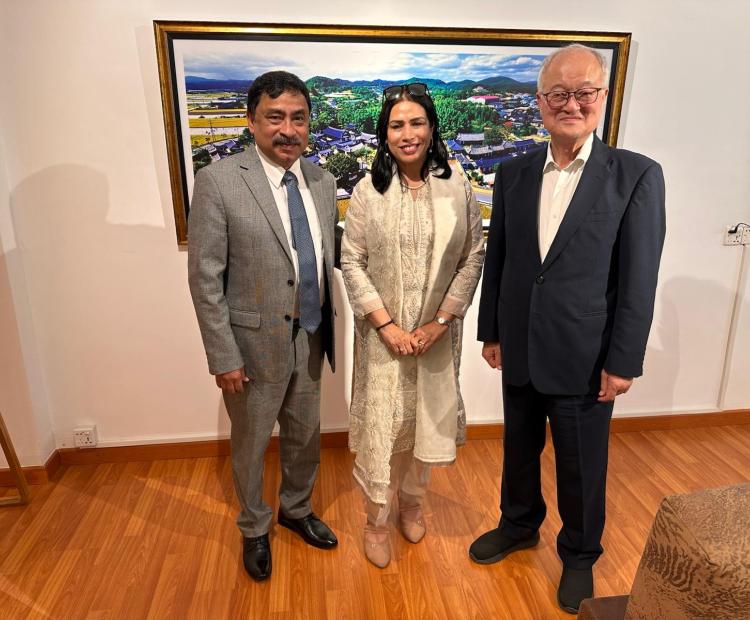 Ambassador Belal, along with his spouse Dr. Dilruba Nasrin, is seen with Mr. Kihak Sung